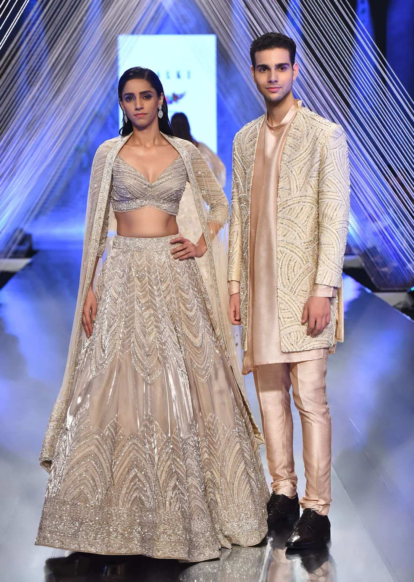 Oyster Organza Lehenga With Cut Dana Embroidery, Crop Top Comes In 3/4Th Sleeves With A Deep V Neckline