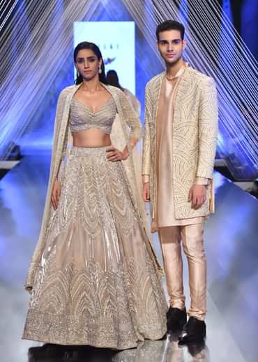 Oyster Organza Lehenga With Cut Dana Embroidery, Crop Top Comes In 3/4Th Sleeves With A Deep V Neckline