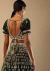 Palace Green Lehenga Choli In Velvet With Short Puff Sleeves And Multi Colored Hand Embroidery In Floral And Geometric Motifs