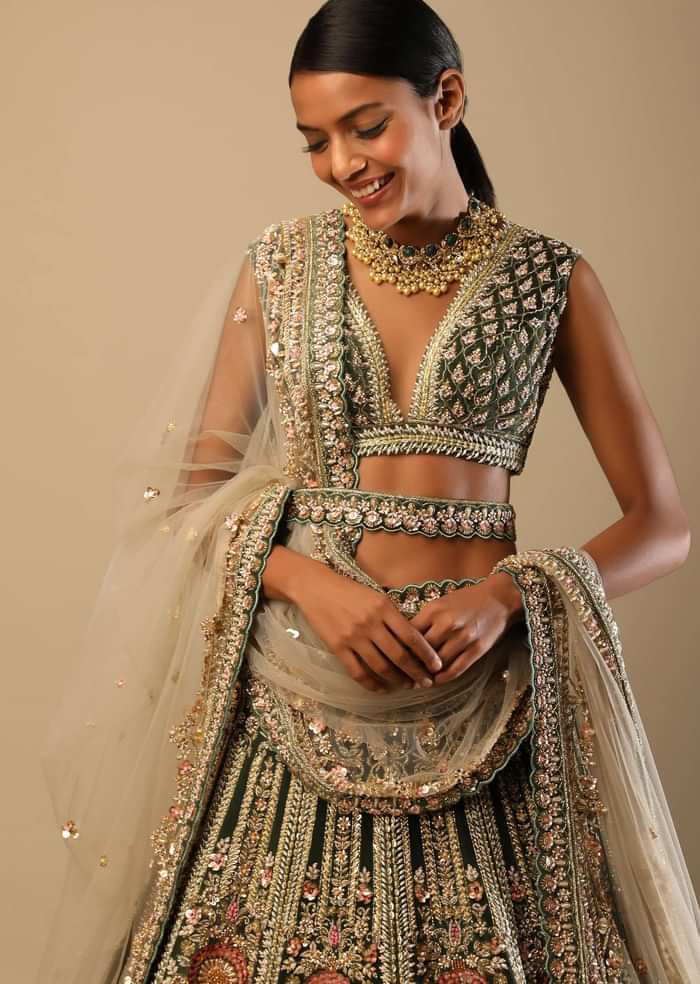Palace Green Lehenga Choli In Velvet With Multi Colored Hand Embroidered Heritage Kalis With Hints Of Flowers