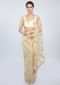 Pale cream sheer net saree with butti and embroidered scallop border only on kalki