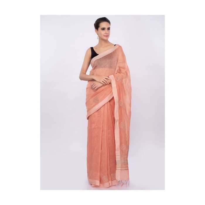 Pale orange linen saree with self moti embroidery and butti only on Kalki