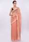 Pale orange linen saree with self moti embroidery and butti only on Kalki