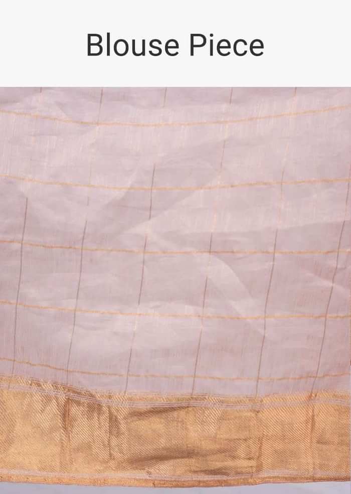 Pale peach linen saree with cut dana and zari butti only on Kalki