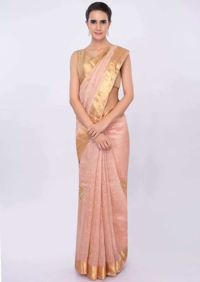 Pale peach linen saree with cut dana and zari butti only on Kalki