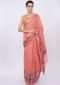 Pale peach linen saree with faded pink line  only on Kalki