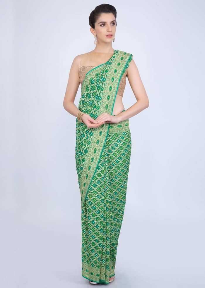 Paris green bandhani printed saree with weaved jaal work  only on kalki