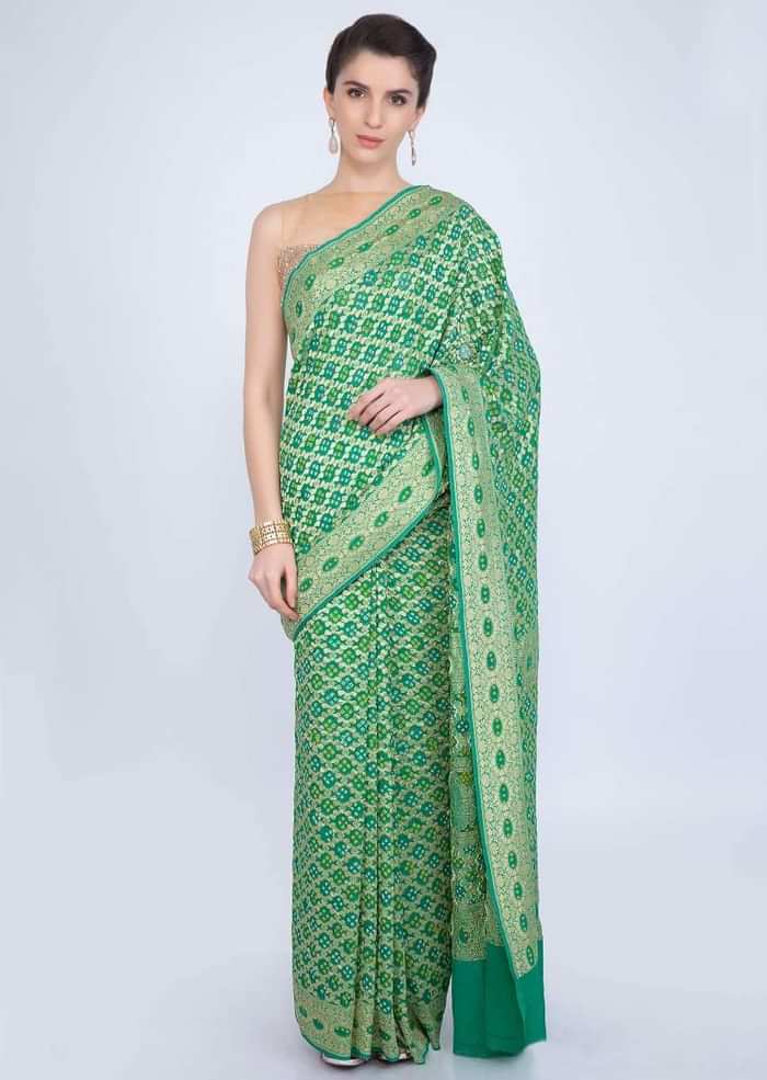 Paris green bandhani printed saree with weaved jaal work  only on kalki