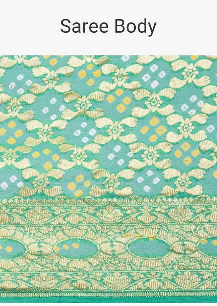 Paris green bandhani printed saree with weaved jaal work  only on kalki