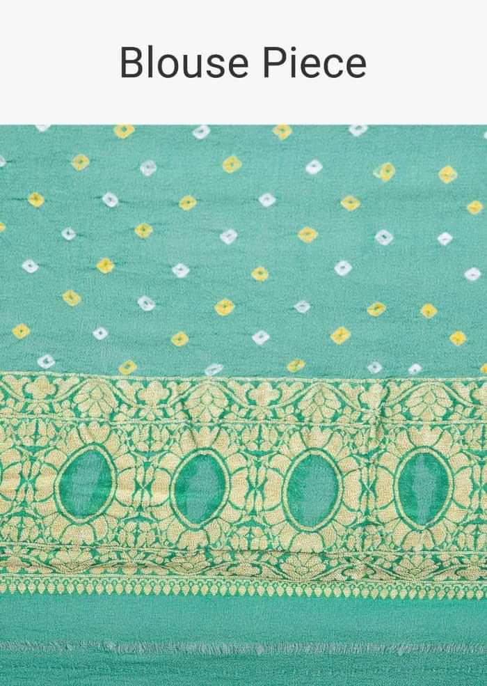 Paris green bandhani printed saree with weaved jaal work  only on kalki
