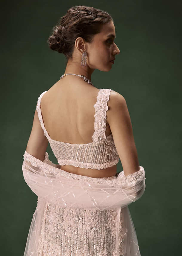 Pastel Pink Mermaid Bridal Lehenga With Intricate Embellishments