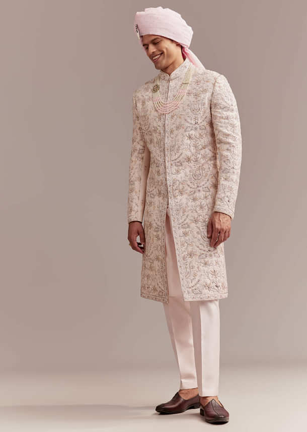 Pastel Pink Silk Sherwani For Groom With Intricate Embroidery