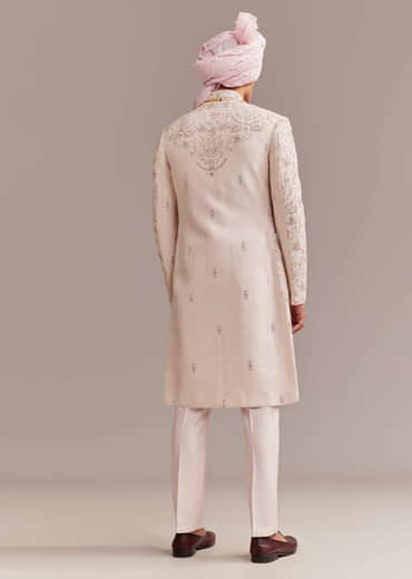 Pastel Pink Silk Sherwani For Groom With Intricate Embroidery
