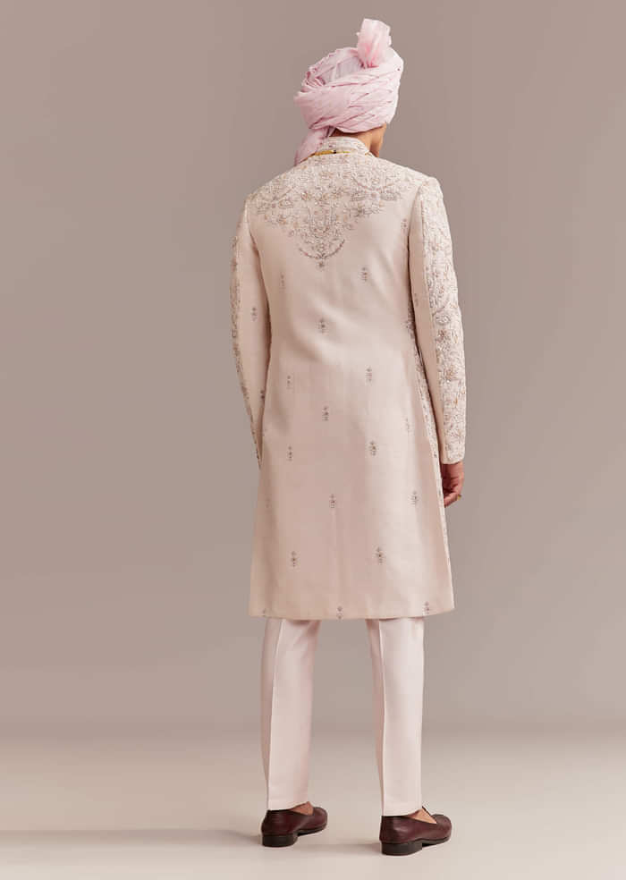 Pastel Pink Silk Sherwani For Groom With Intricate Embroidery