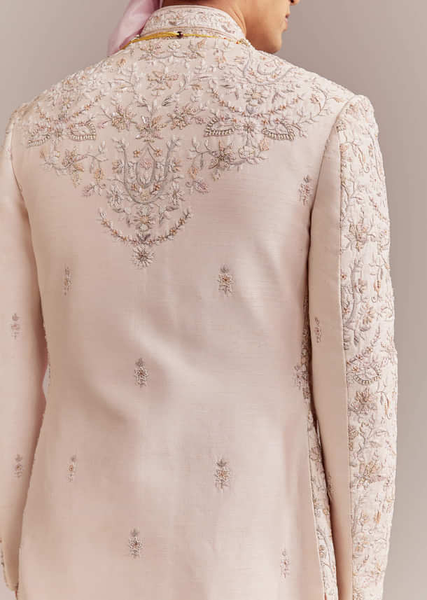 Pastel Pink Silk Sherwani For Groom With Intricate Embroidery