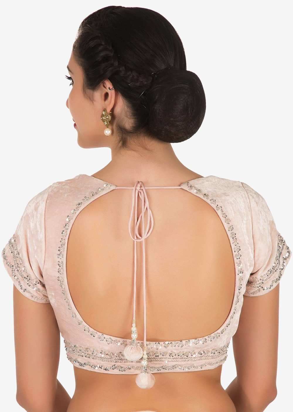 Pastel hued saree in net with velvet blouse adorn in heavy sequin and thread embroidered work only on Kalki