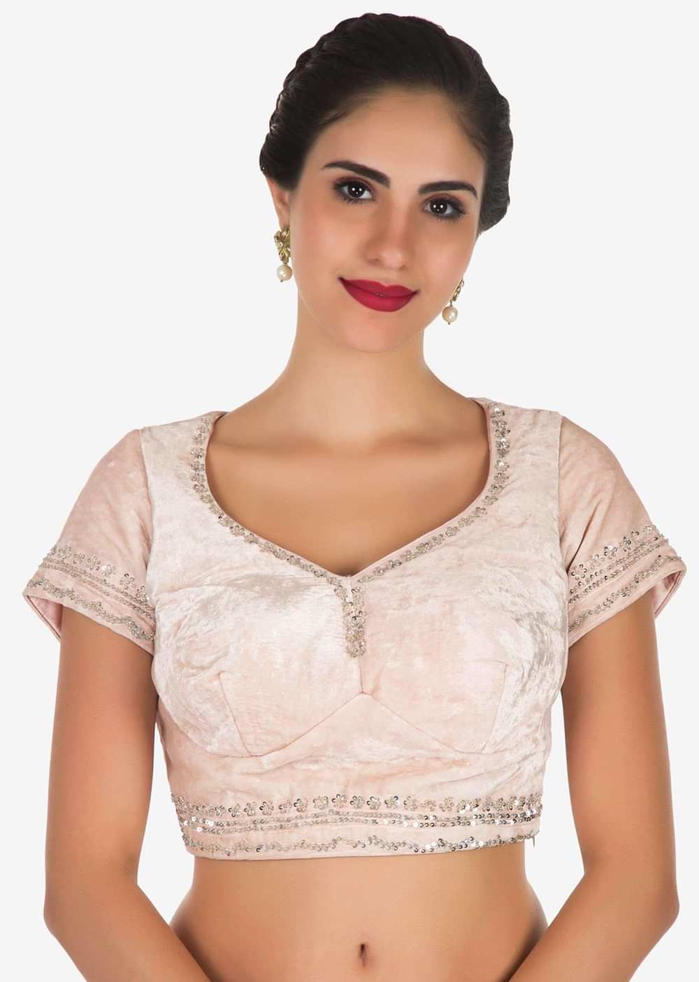 Pastel hued saree in net with velvet blouse adorn in heavy sequin and thread embroidered work only on Kalki