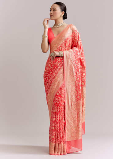 Peach Georgette Woven Saree With Floral Jaal And Heavy Border