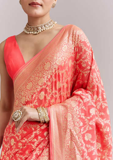 Peach Georgette Woven Saree With Floral Jaal And Heavy Border