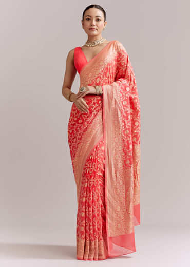 Peach Georgette Woven Saree With Floral Jaal And Heavy Border