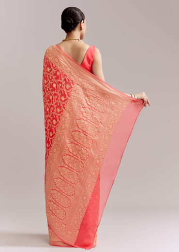 Peach Georgette Woven Saree With Floral Jaal And Heavy Border
