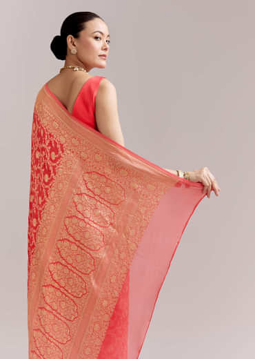 Peach Georgette Woven Saree With Floral Jaal And Heavy Border