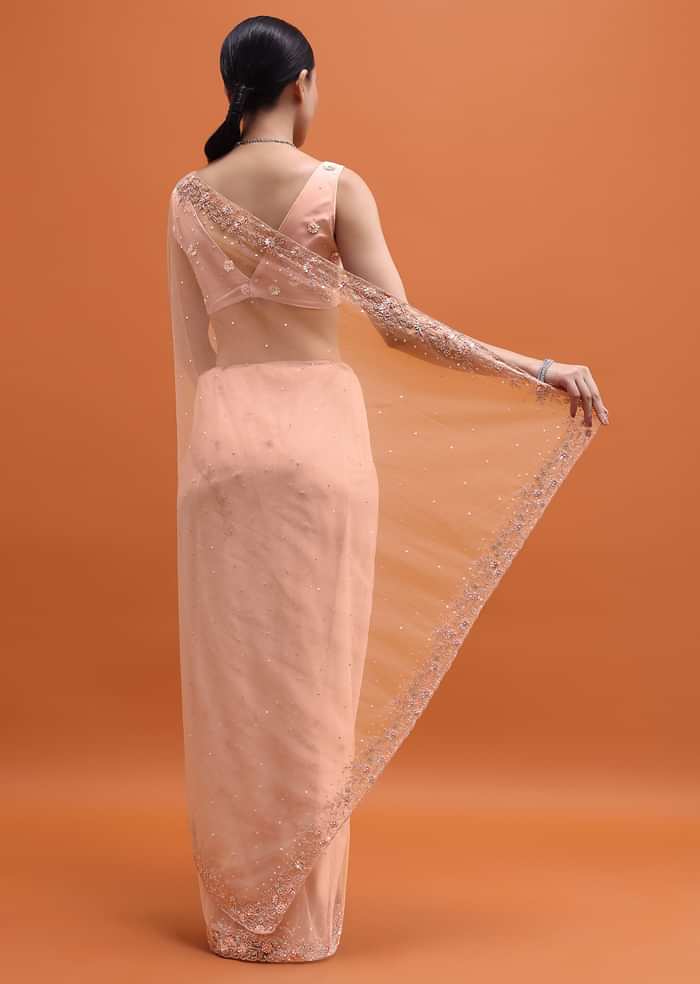 Powder Pink Embroidered Net Saree With Unstitched Blouse