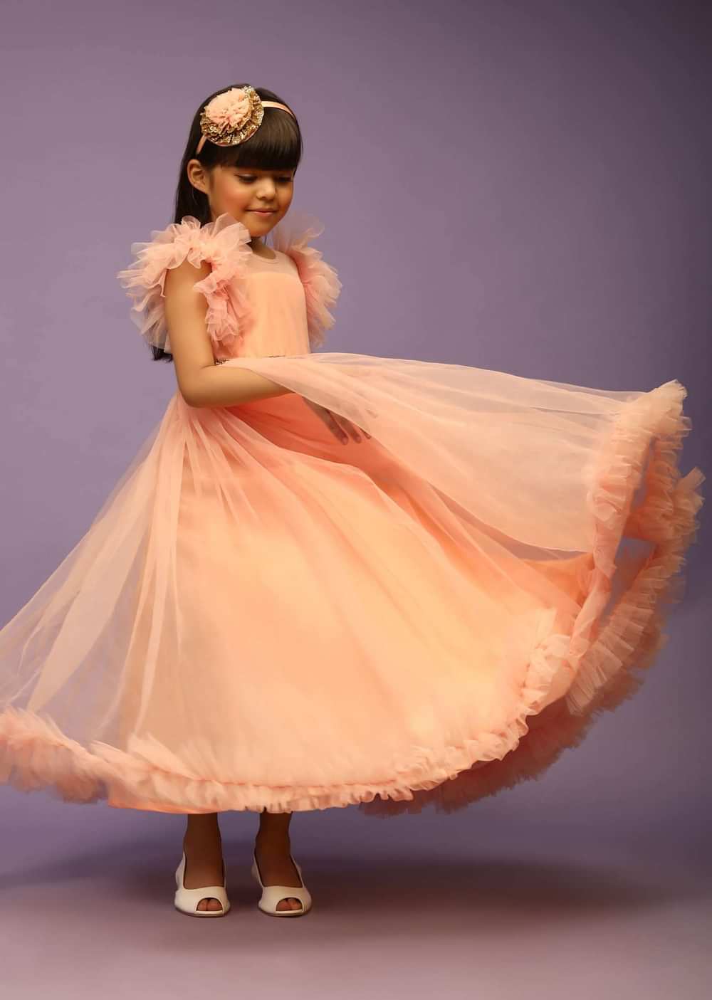 Kalki Girls Peach Gown In Net With Frill Sleeves And Glitter Belt