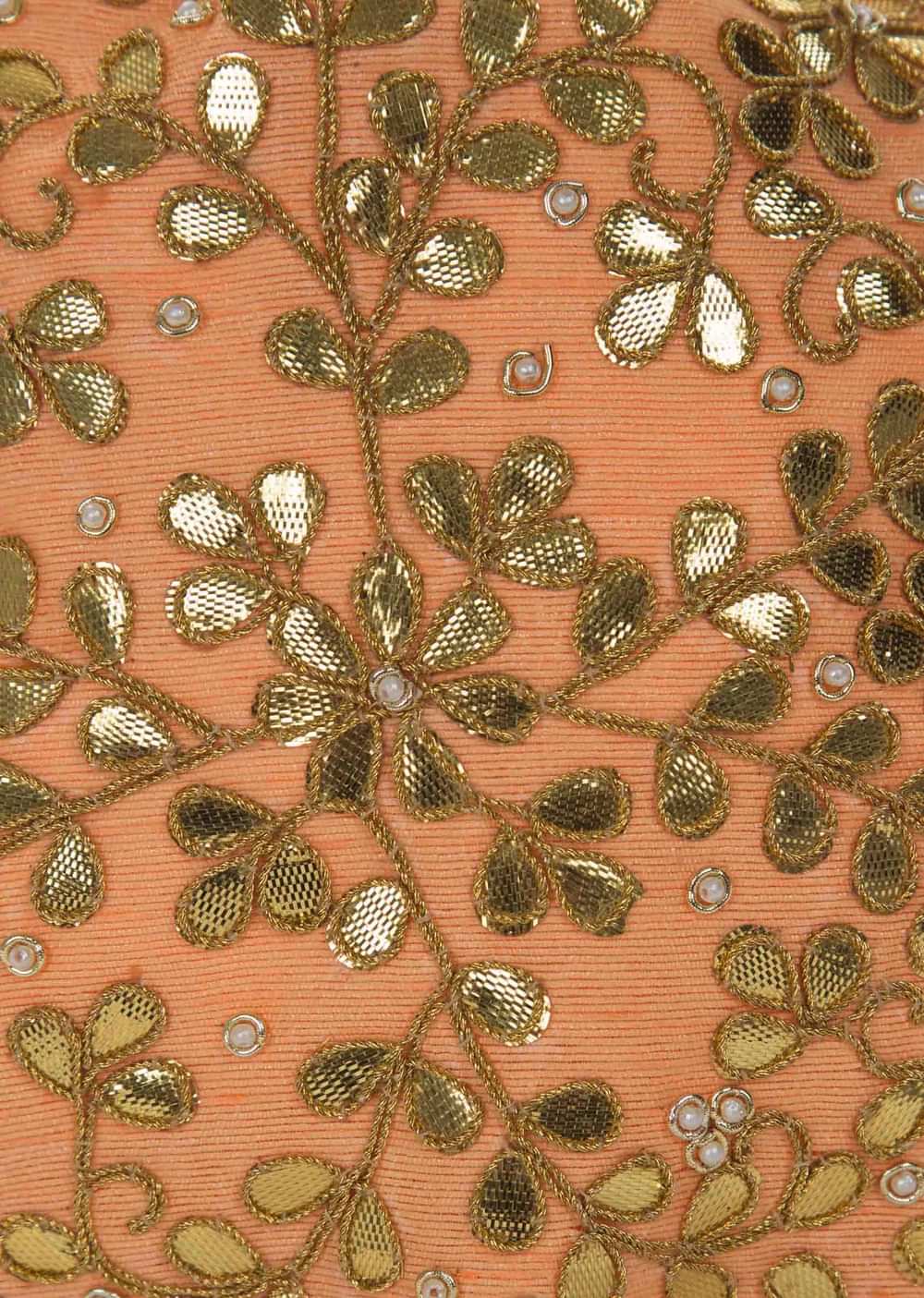 Peach potli bag beautified in gotta patti embroidered work only on Kalki