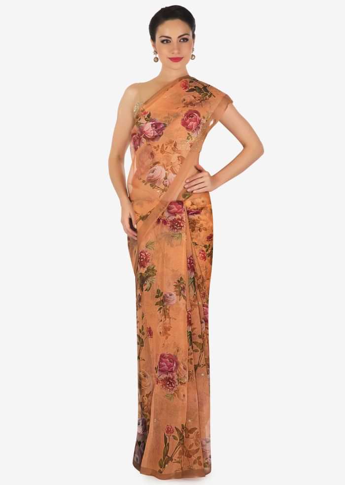 Peach saree features in tissue silk with sequin embroidery only on Kalki