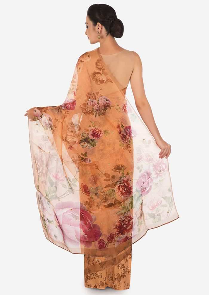 Peach saree features in tissue silk with sequin embroidery only on Kalki