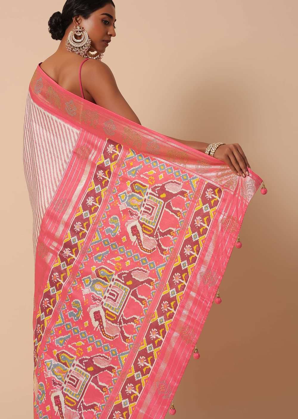 Peach Silk Patola Print Saree With Foil Worked Border And Unstitched Blouse Piece