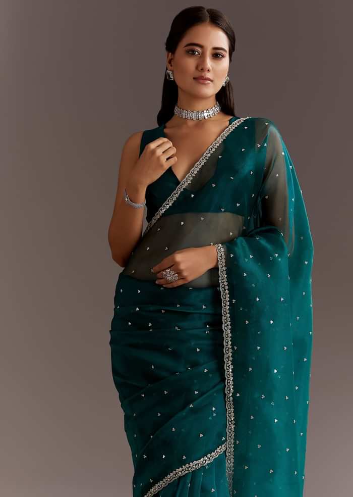 Teal Green Glass Tissue Saree With Cutdana And Sequins Scallop Border