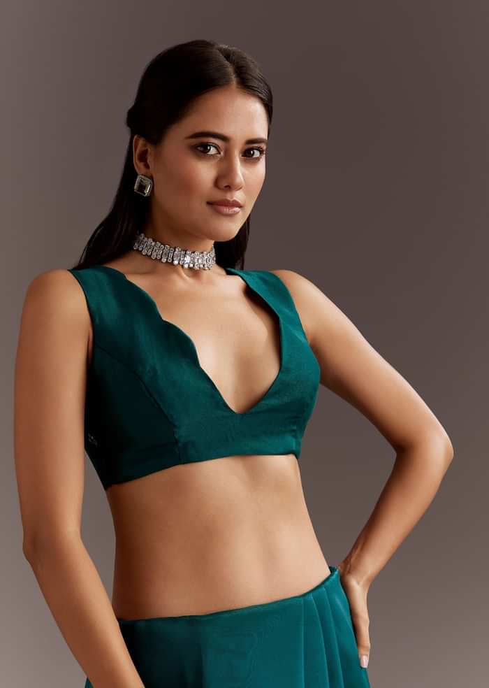 Teal Green Glass Tissue Saree With Cutdana And Sequins Scallop Border