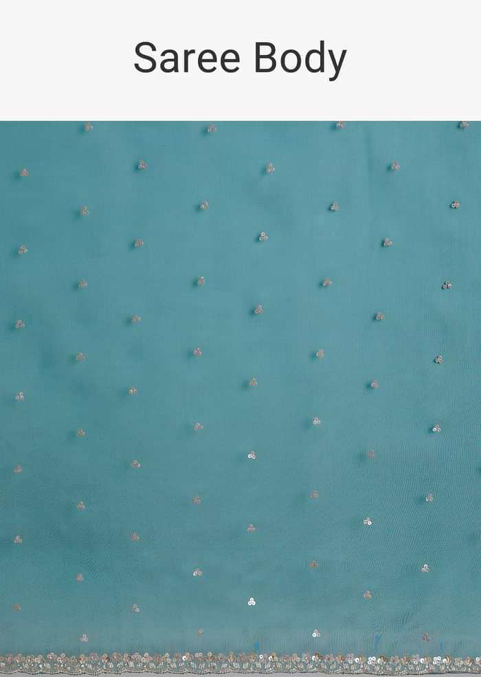 Teal Green Glass Tissue Saree With Cutdana And Sequins Scallop Border