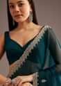 Peacock Green Organza Saree With Cutdana And Sequins Border