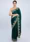 Peacock green satin saree with cut dana floral embroidered border only on Kalki