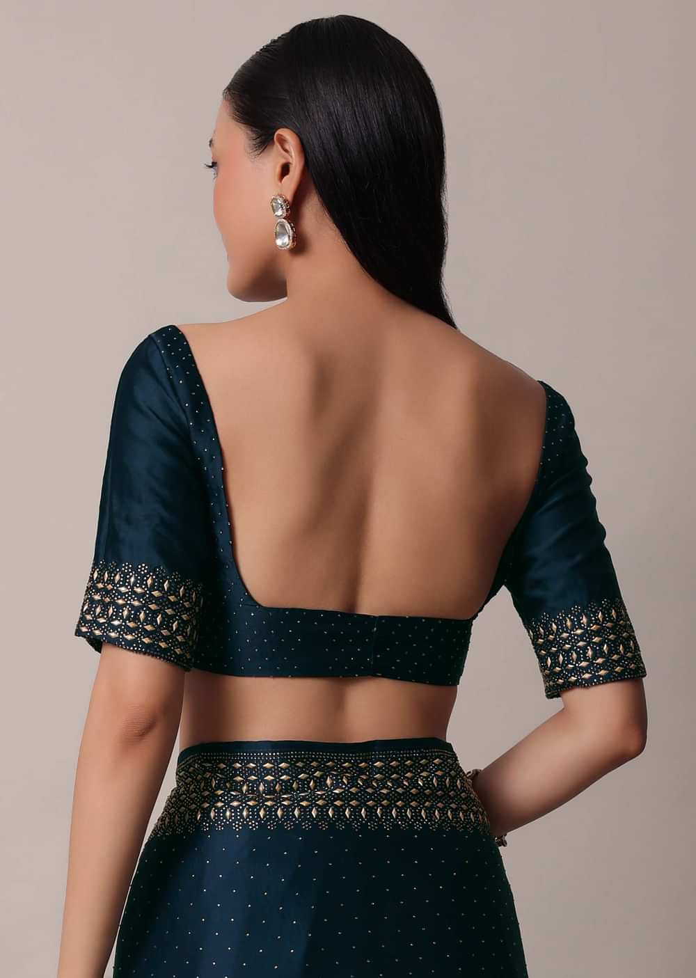 Peacock Blue Saree In Satin With Embellishments And Unstitched Blouse Piece