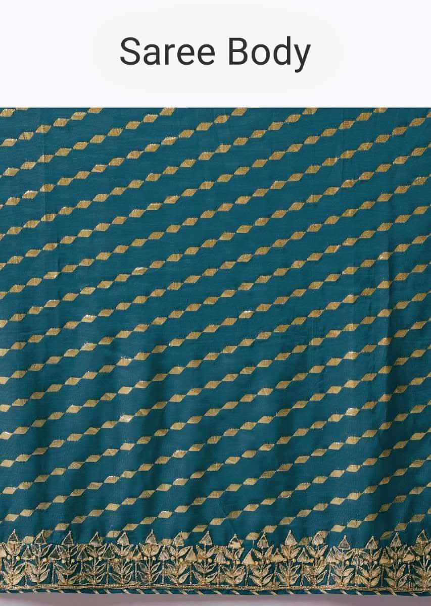 Peacock Green Saree In Brocade Silk With Woven Stripes And Gotta Embroidered Border Along With Unstitched Blouse Online - Kalki Fashion