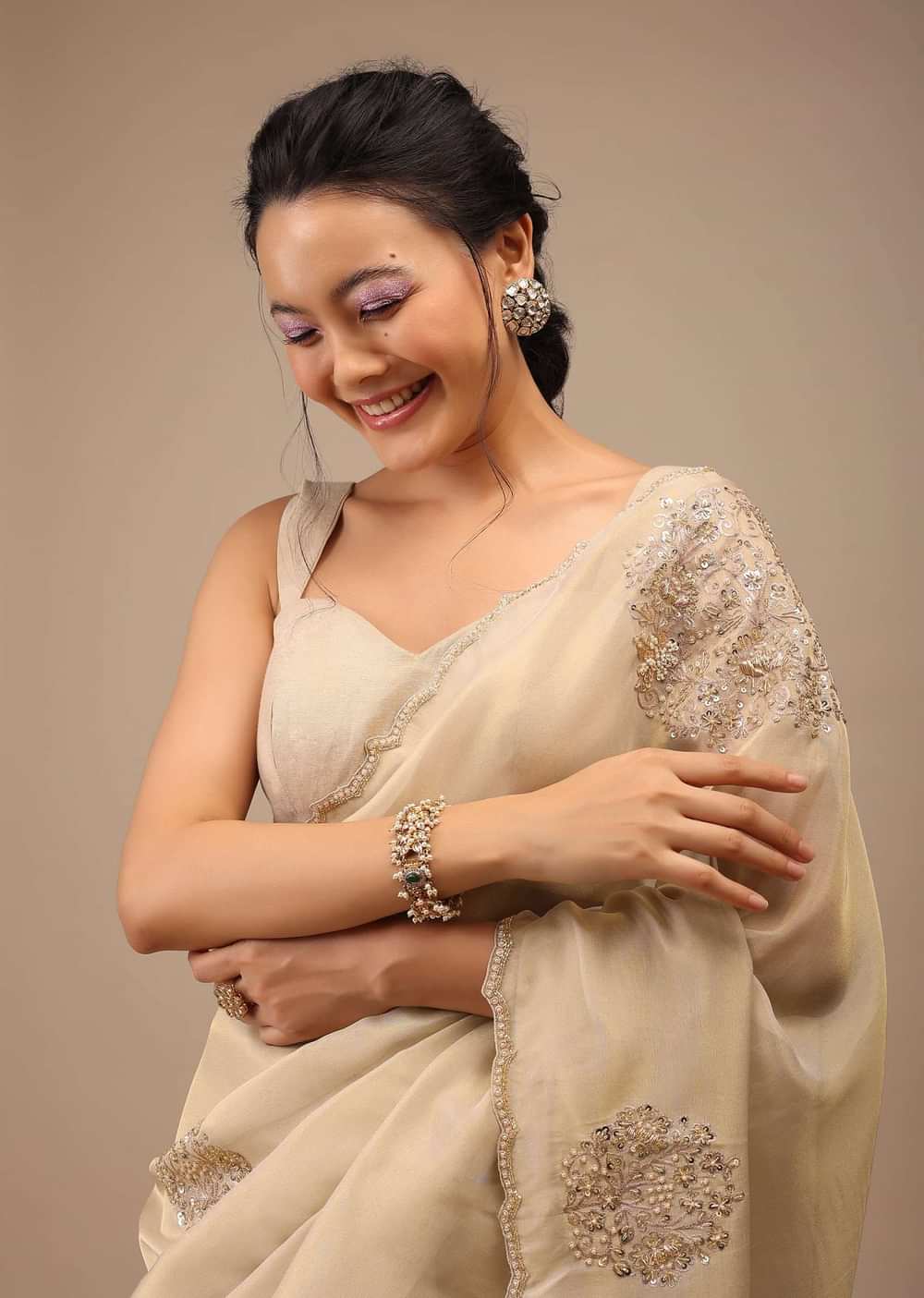 Pebble Brown Glass Tissue Saree Adorned With Floral Buttis, Zardosi Embroidery And 3D Sequins