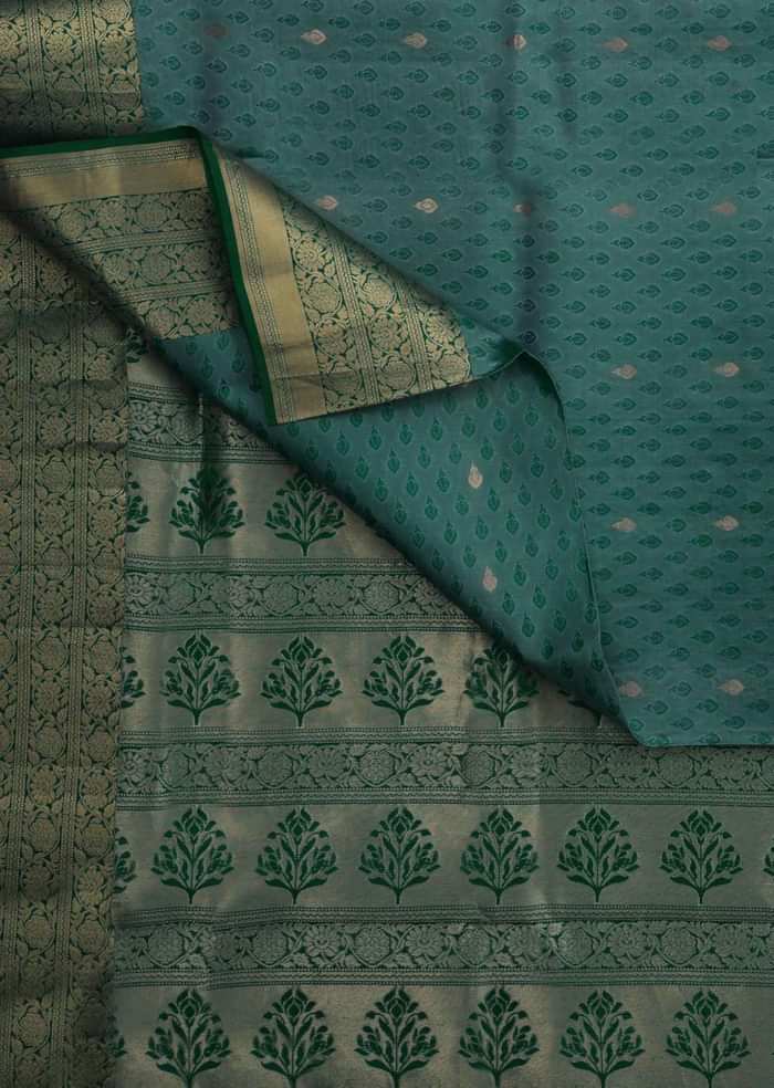 Peocock saree in silk beautified in weaved embroidery only on Kalki