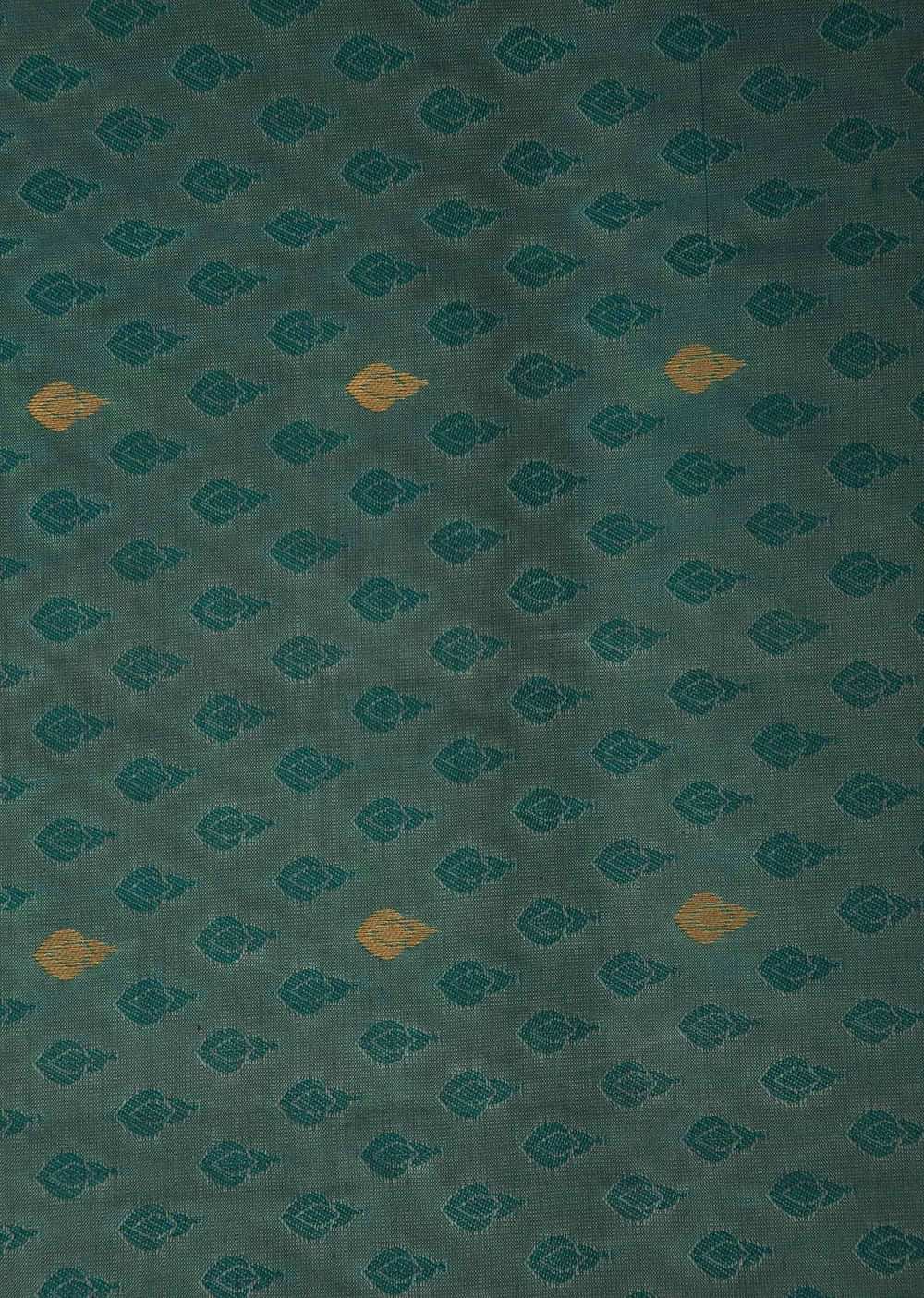 Peocock saree in silk beautified in weaved embroidery only on Kalki