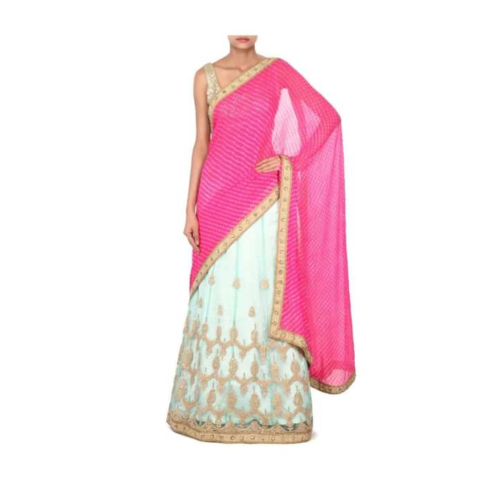 Pink and green lehenga saree enhanced in embroidered butti only on Kalki