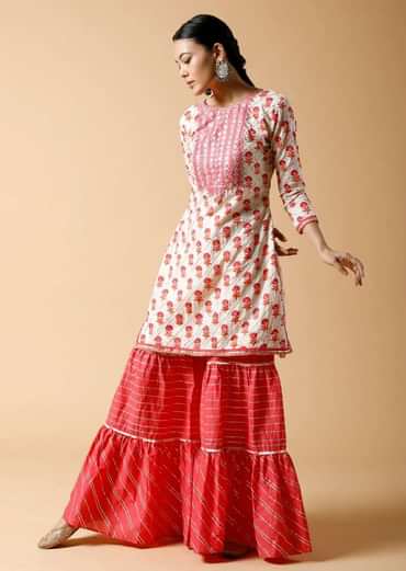 Pink And White Sharara Suit With Printed Floral Buttis And Detailed Using Zari And Gotta Lace
