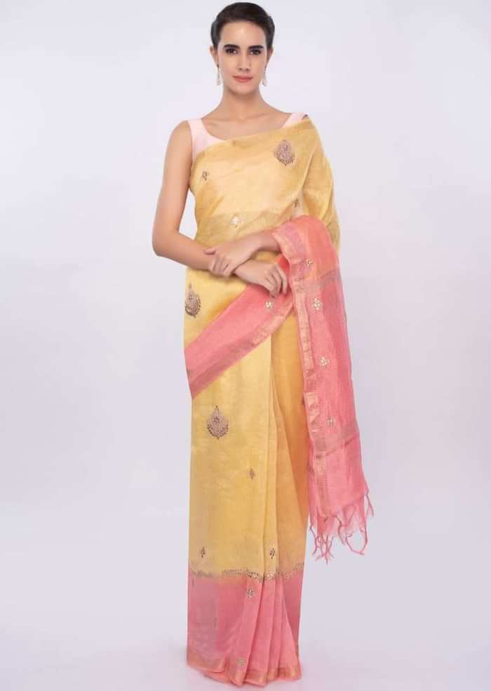 Pink and yellow shaded embroidered linen saree only on Kalki