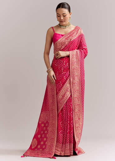 Pink Georgette Woven Saree With Floral Border And Bandhani Print