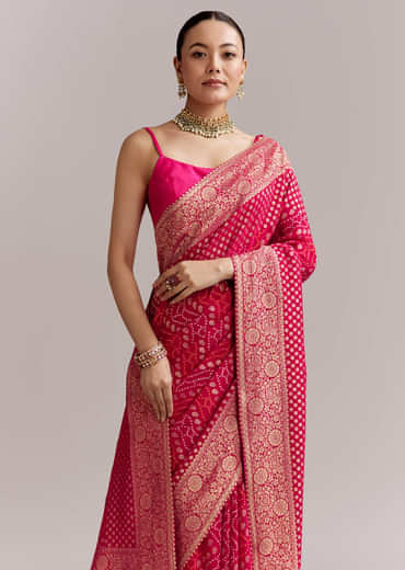 Pink Georgette Woven Saree With Floral Border And Bandhani Print