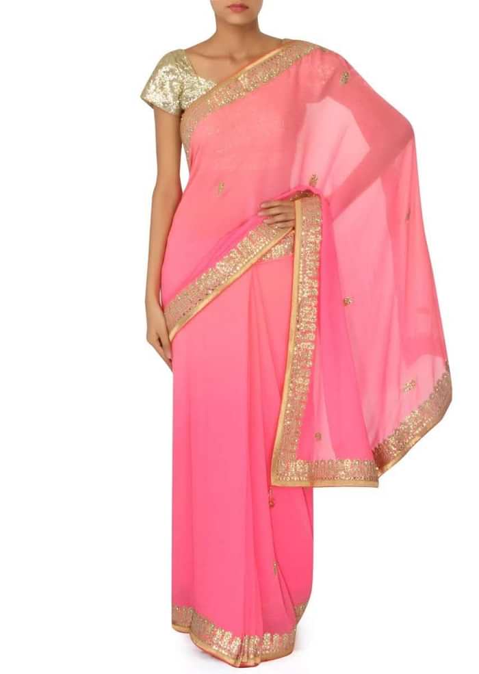 Champagne pink saree adorn in gotta patch embroidered border only on Kalki