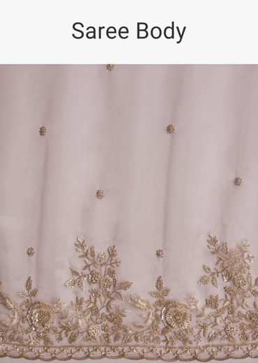 Pink Tissue Saree Adorned With Scallop Border And Heavy Embroidery