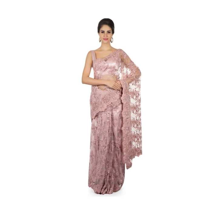 Pink embroidered net saree with scalloped border only on Kalki